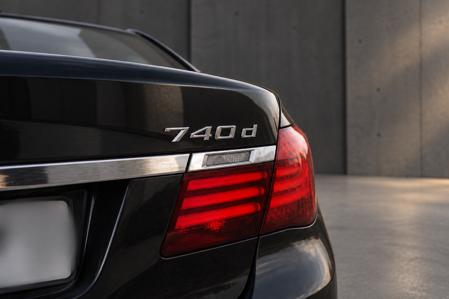 740d-Schriftzug und Rückleuchte am BMW F01